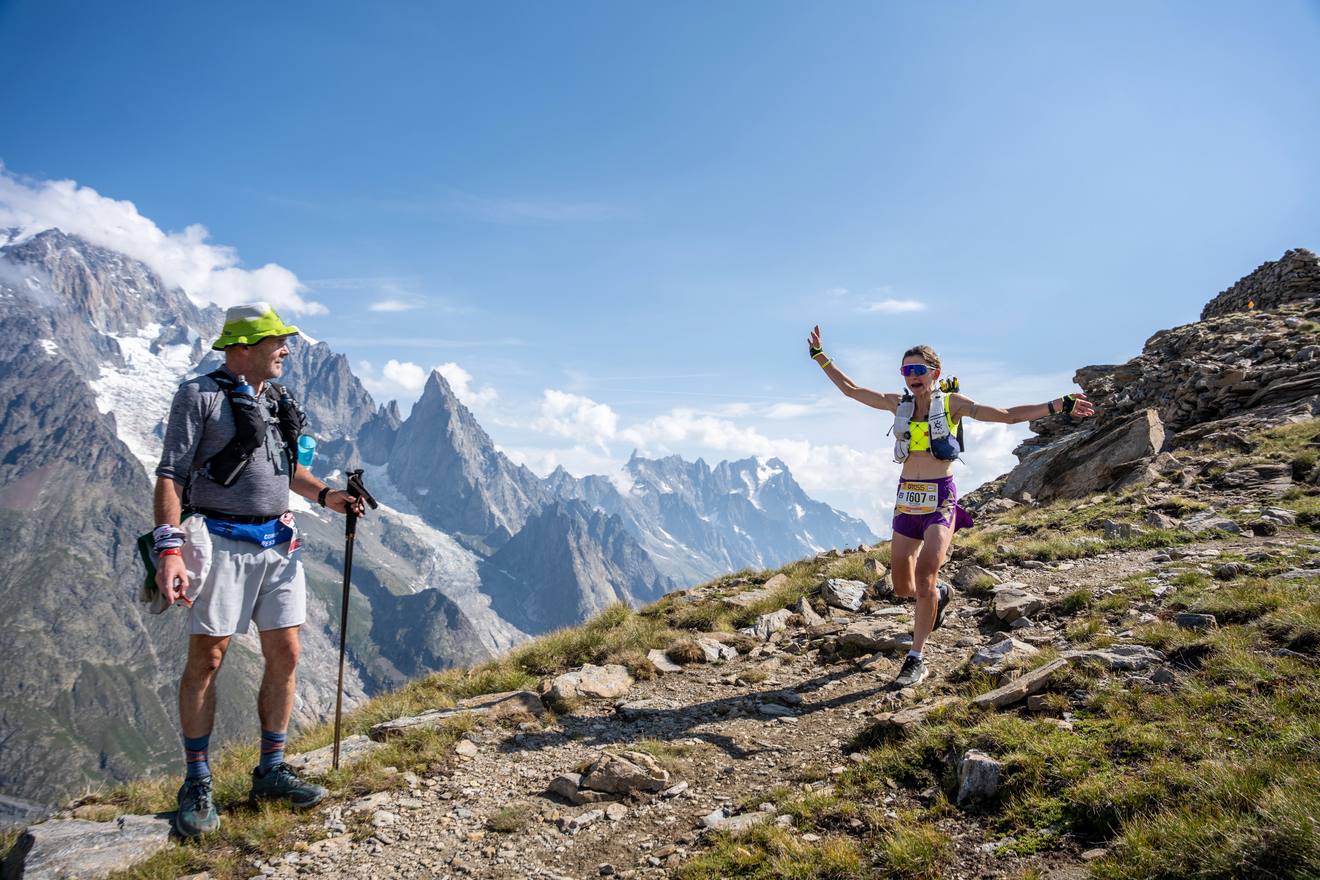 Victoria Stansfield running a mountain ridge with the Mont Blanc massif behind